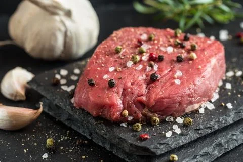 Beef steak with spices Stock Photos