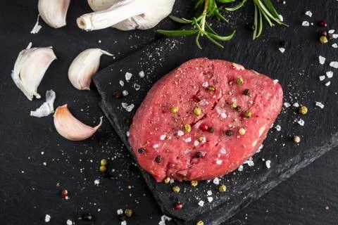 Beef steak with spices Stock Photos