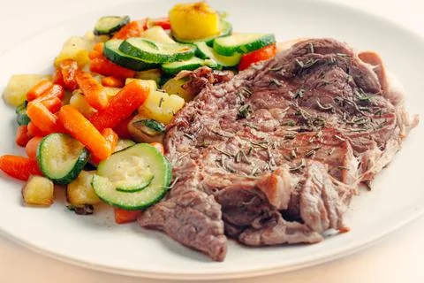 Beef steak with vegetables. High quality photo. Stock Photos