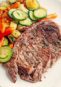 Beef steak with vegetables. High quality photo. Stock Photos