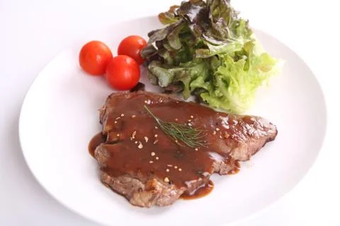 Beef steak in white background Stock Photos