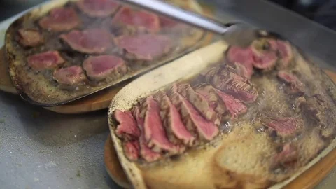 Beef Steaks Being Fried And Poured With Butter Stock Footage 83587636