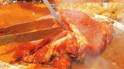 Beef steaks on the grill with flames Video stock 87811077