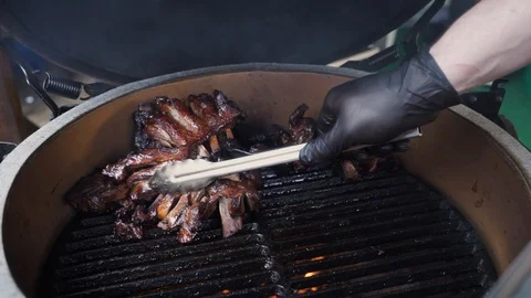 Beef steaks on the grill with flames Stock Footage 127973878