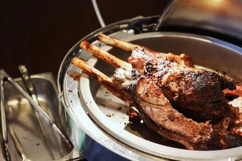 Beef steaks on the grill with flames Stock Photos