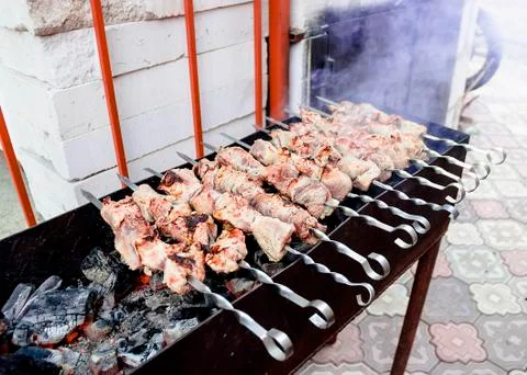 Beef steaks on the grill with flames Stock Photos