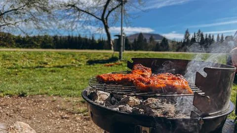 Beef steaks on the grill with flames Stock Photos