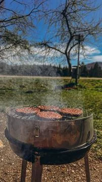 Beef steaks on the grill with flames Stock Photos