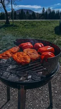 Beef steaks on the grill with flames Stock Photos