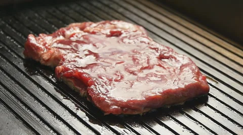 Beef steaks on the grill Stock Footage 65116971