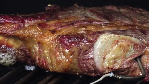 Beef steaks on the grill with temperature sensor in it Stock-Footage 250157996