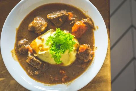 Beef stew Beef cube cooked overnight in Guinness, red wine, barley and herb.. Stock Photos