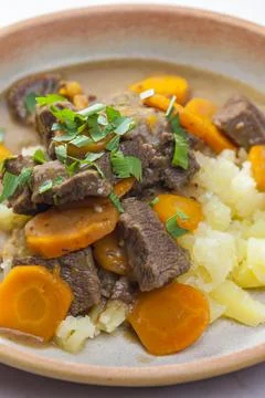 Beef stew with carrot and mashed potatoes Stock Photos