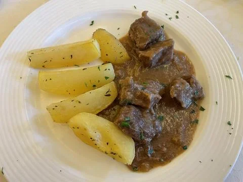 Beef stew with roasted potatoes Stock-Fotos