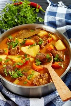 Beef stew with vegetables in pot Stock Photos