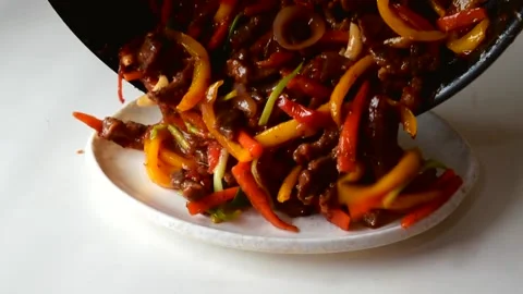 Beef stir fry serving on white plate 動画素材 149506613