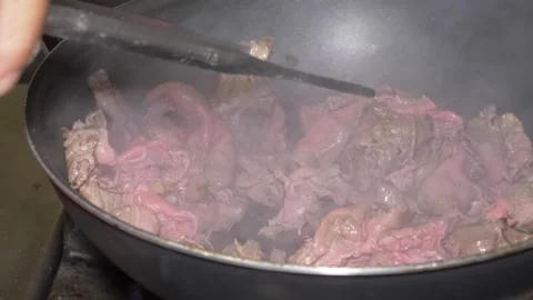 Beef Straccetti Browning and Searing to Perfection in a Hot Pan 動画素材 336793681