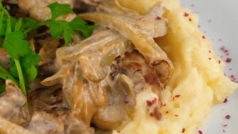Beef stroganoff, close-up view, meat, mashed potato and mushrooms Stock Footage 95149717