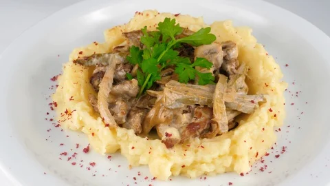 Beef stroganoff with mashed potato and mushrooms, served in Restaurant Stock Footage 95148220