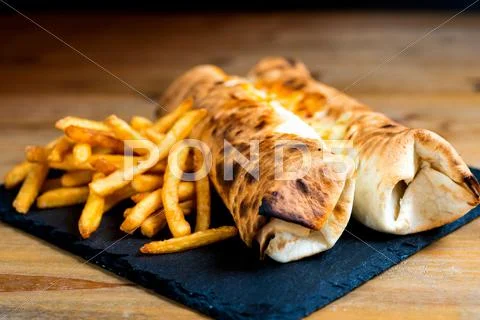 Beef tacos served with lettuce and Golden French fries Stock Photos