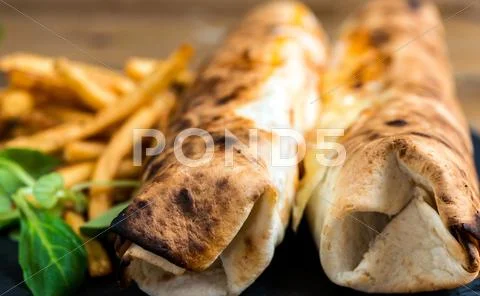 Beef tacos served with lettuce and Golden French fries Stock Photos