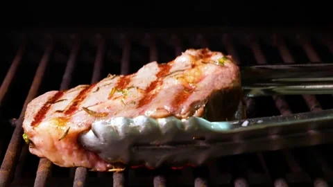 Beef tender steak on the grill. Chef making steak. 스톡 동영상 245610196