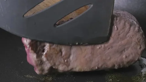 Beef Turning in Pan Slow Motion Stock Footage 169612296