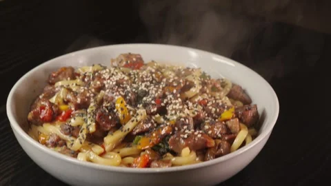 Beef Udon with Broccoli and Peppers Stock Footage 321770744