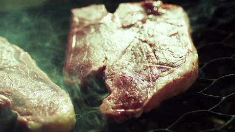 Beefsteak Black Angus Raw Piece on Bbq Closeup Stock Footage 156895042