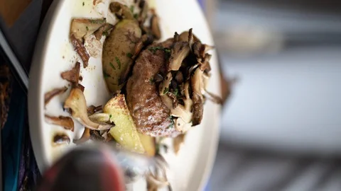 Beefsteak with mushrooms Stock Footage 128127936