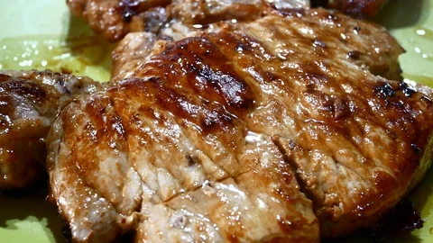 Beefsteak Pork Chop Steak 4K Video Close-up Stock Footage