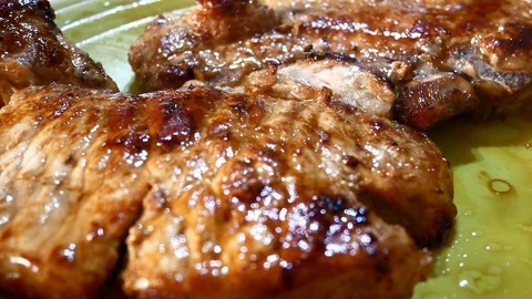 Beefsteak Pork Chop Steak 4K Video Close-up Stock Footage 103339996