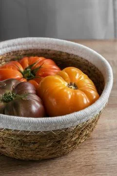 Beefsteak tomatoes in a basket Stock Photos