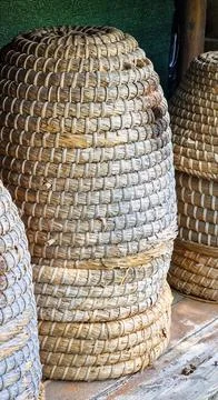 Beehive made of straw Stock Photos