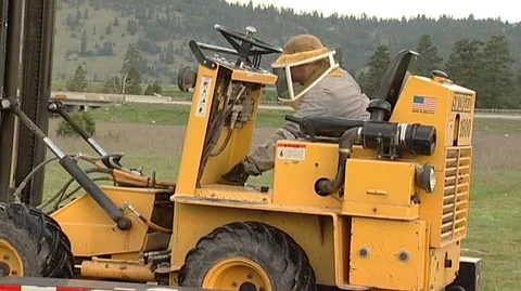 Beekeeper on Forklift Stock Footage 93203994