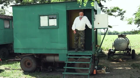 Beekeeper. Portrait of a beekeeper on apiary at hive Video stock 64739465