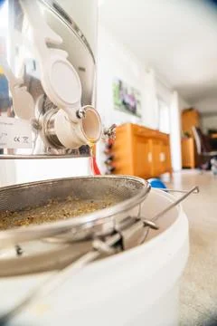 Beekeeping Bee Honey Trickleling Down the Barrel After Centrifugal Extraction Stock Photos