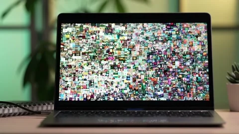 Beeple Pattern NFT Token on a Laptop Screen Closeup Stock Footage 168306598