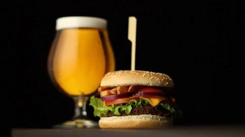 Beer and cheeseburger Stock Footage 124989034