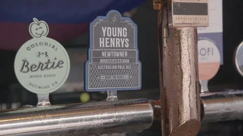 Beer and Cider Taps with Condensation at Bar Counter in Sydney, Australia Stock Footage 345664252