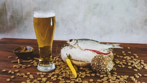 Beer and dried fish.  Stock Footage 84000529