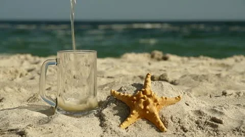 Beer and Starfish on the beach Stock Footage 10893056