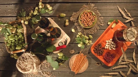 Beer and a variety of snacks on the table. 動画素材 79866720