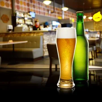Beer in bar interior Stock Photos