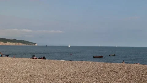Beer, beach looking to far chalk cliff 스톡 동영상 138063948