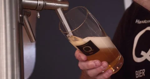 Beer Being Poured into Mug in Beer Garden Close Up, Berlin 22st July 2020 Stock Footage 335143763