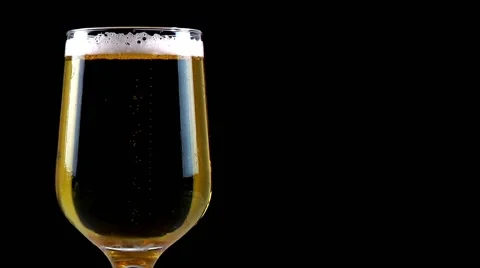 Beer on black background Stock Footage