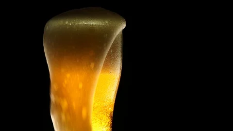 Beer on a black background. Video stock 117096460