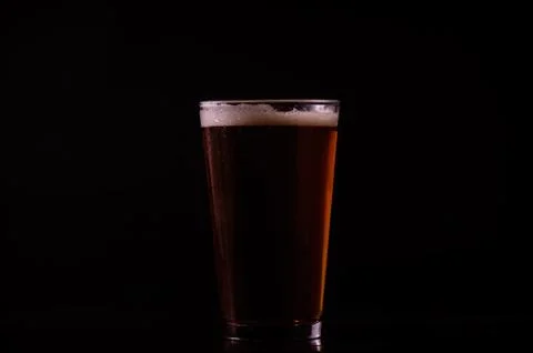 Beer on black background Fotos de archivo