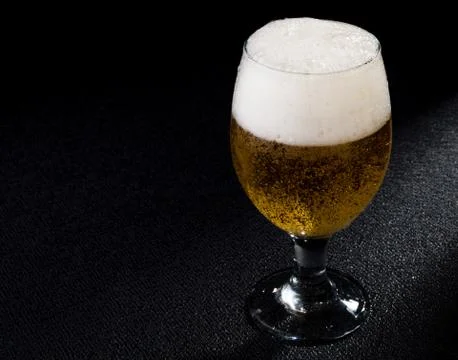 Beer on black Foto stock